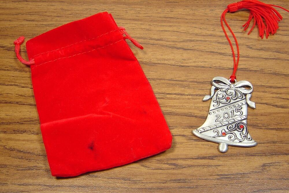 AVON PEWTER ORNAMENT-BELL WITH RED RHINESTONE ACCENTS-2015-RED VELVET BAG